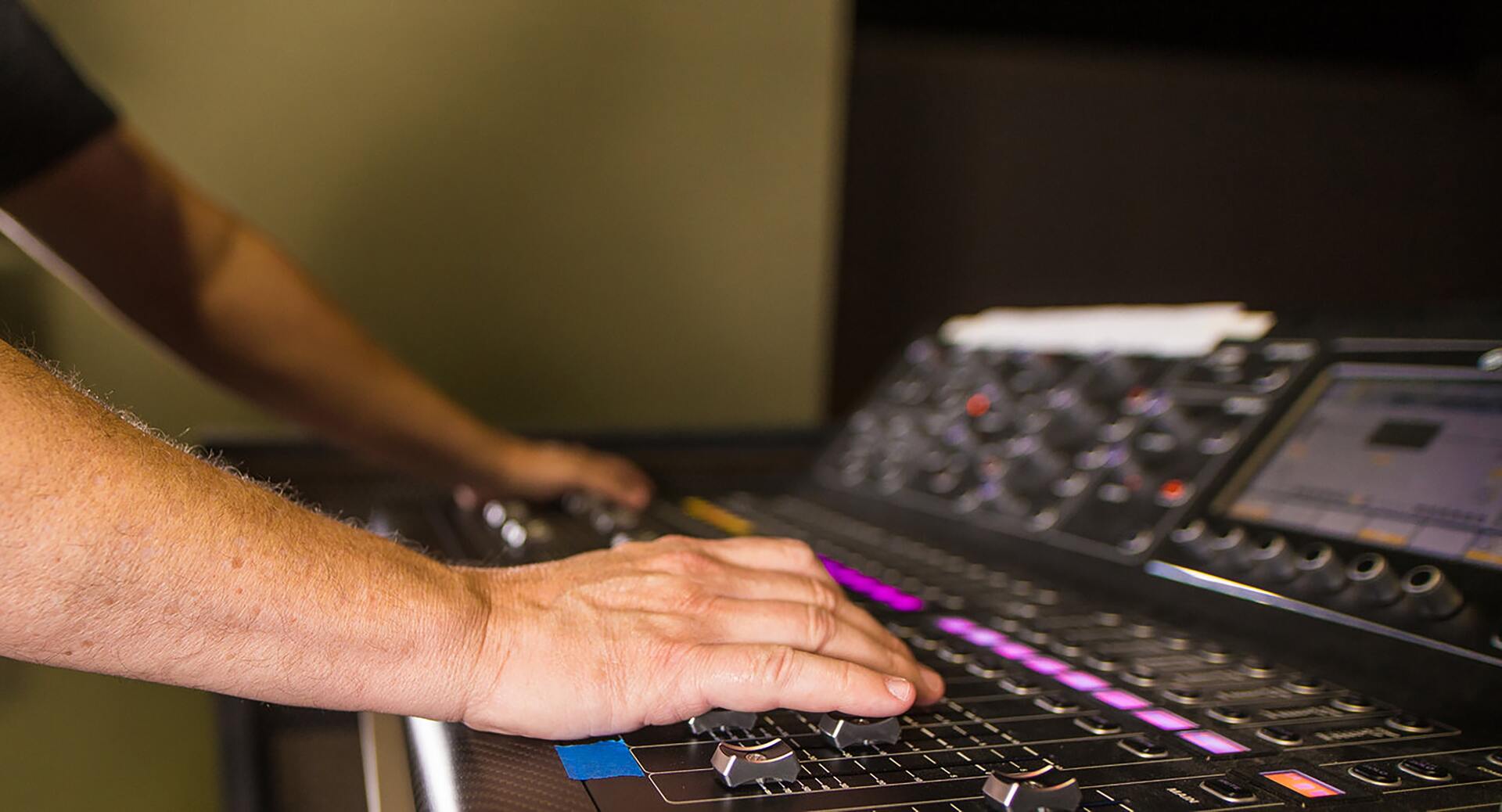 Фото музыка редактор. Man putting his head on the Audio Mixer. Picture of man putting his head on the Audio Mixer.